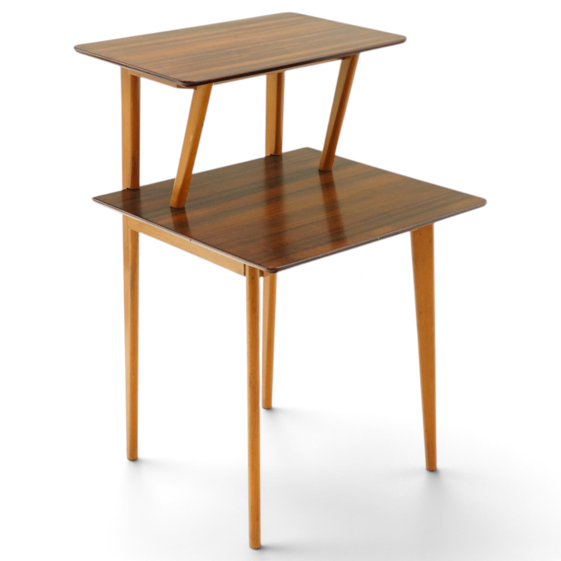 Peter Haywood for Heals - mid-20th century teak and beech two-tier occasional table, raised on tapering supports