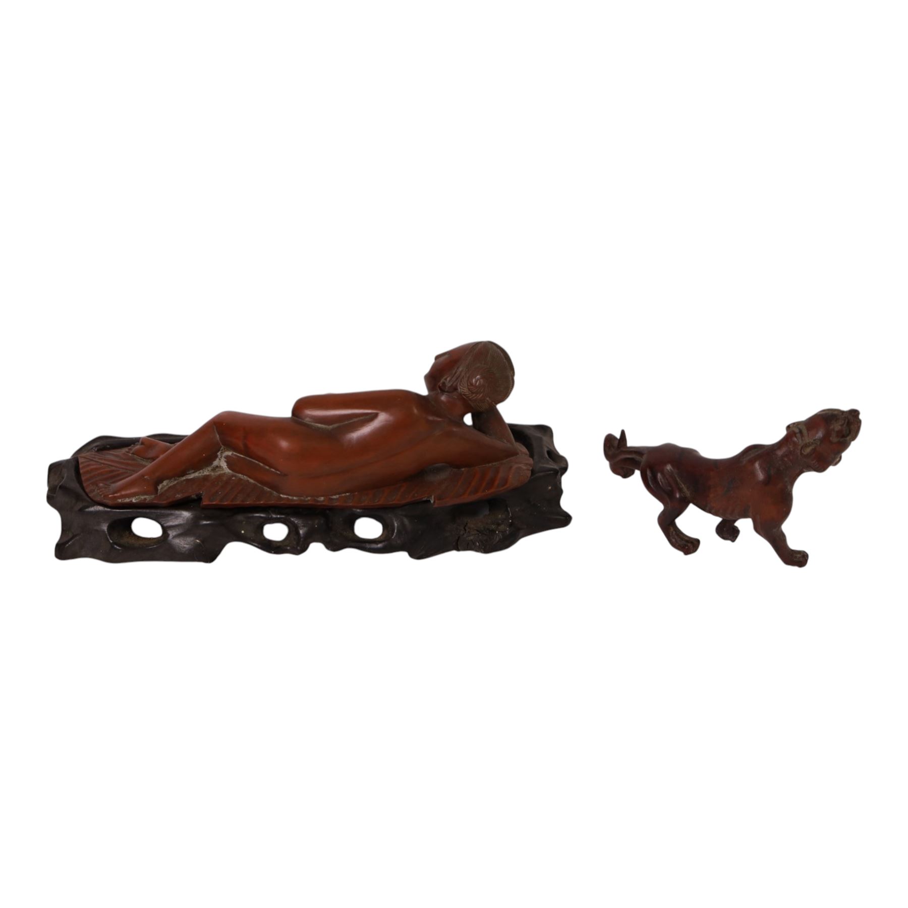 Chinese carved hardwood figural group of two boys climbing on the back of a water buffalo, sitting on a carved and pierced hardwood stand, W30cm; together with a carved reclining figure of a woman and a figure of a tiger (3)
