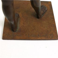 Hylton Stockwell (British): Limited edition bronze sculpture of a woman pulling a shirt over her head, signed and dated 2002, 2/4, H22cm