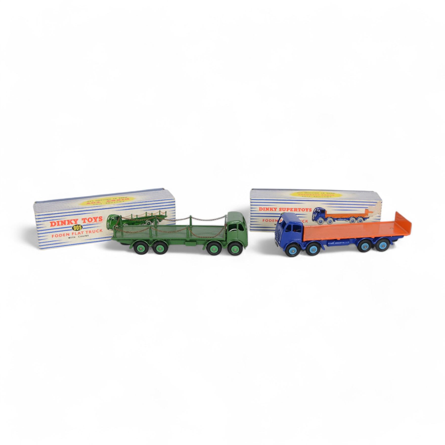 Two Meccano Dinky Supertoys diecast models, comprising Foden Flat Truck with Tailboard no. 903, in blue and orange finish, and Foden Flat Truck with chains, in green finish, both boxed, no. 905 in dual numbered box
