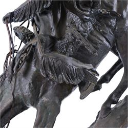 After Frederick Remington; The Mountain Man bronzed spelter figure of a native American trapper upon a marble base with plaque, H72cm
