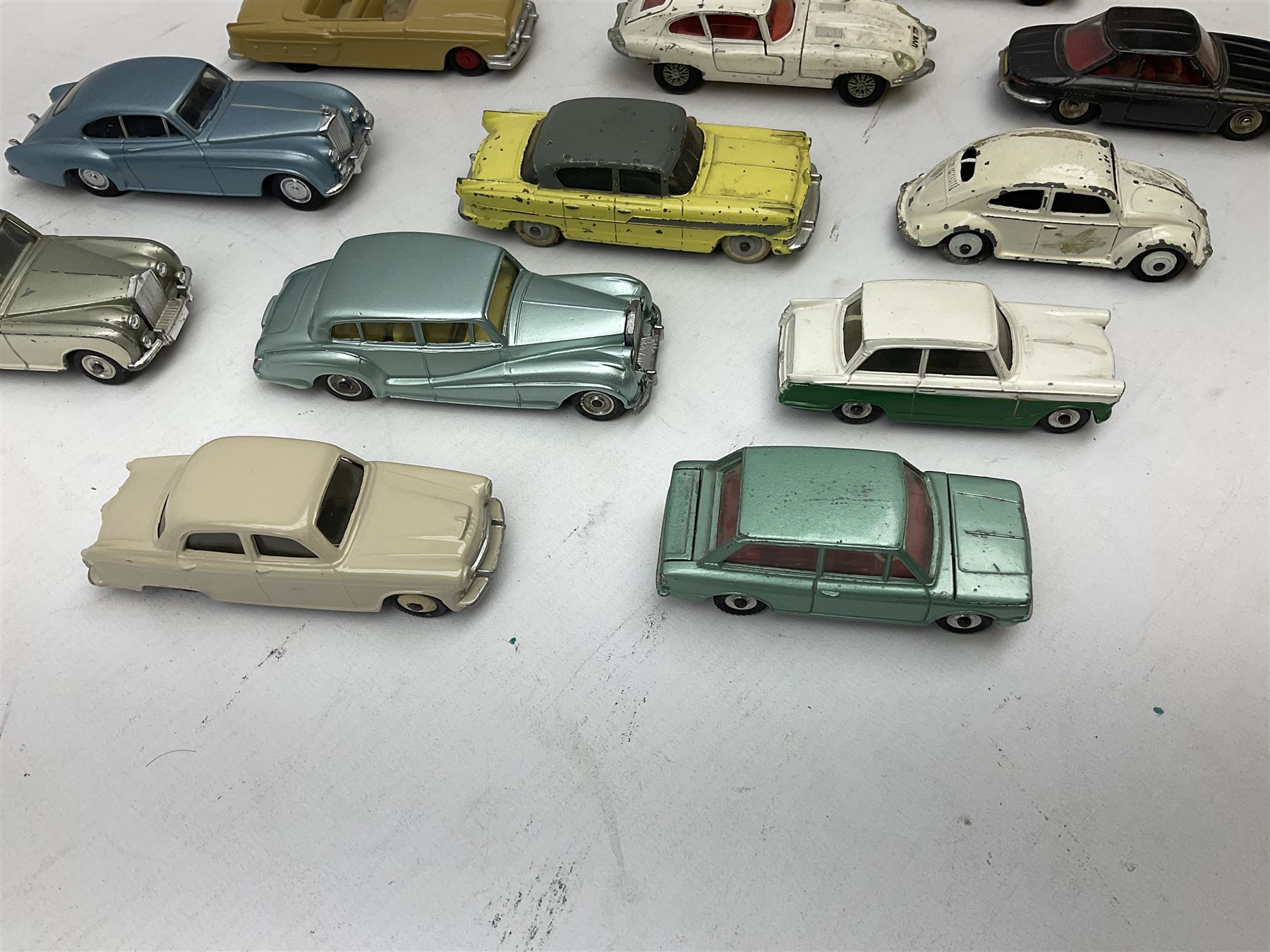 Dinky - thirteen unboxed and playworn/repainted early die-cast cars including Packard No.132, Austin A105 No.176, Rolls-Royce Silver Wraith No.150, Triumph Herald, Hillman Imp No.138, Rolls-Royce Phantom V No.198, Jaguar 'E' Type 2+2 No.131, Chevrolet El Camino No.449, French Panhard 24 No.524, Hudson Hornet No.174 etc; and Matchbox Dinky 1955 Bentley 'R' Type Continental (14)