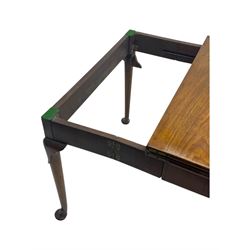 George III mahogany fold-top card table, shaped rectangular top opening to reveal a baize-lined surface, supported by a concertina pull-out concertina rear mechanism, raised on cabriole supports with foliate carvings terminating in pad feet