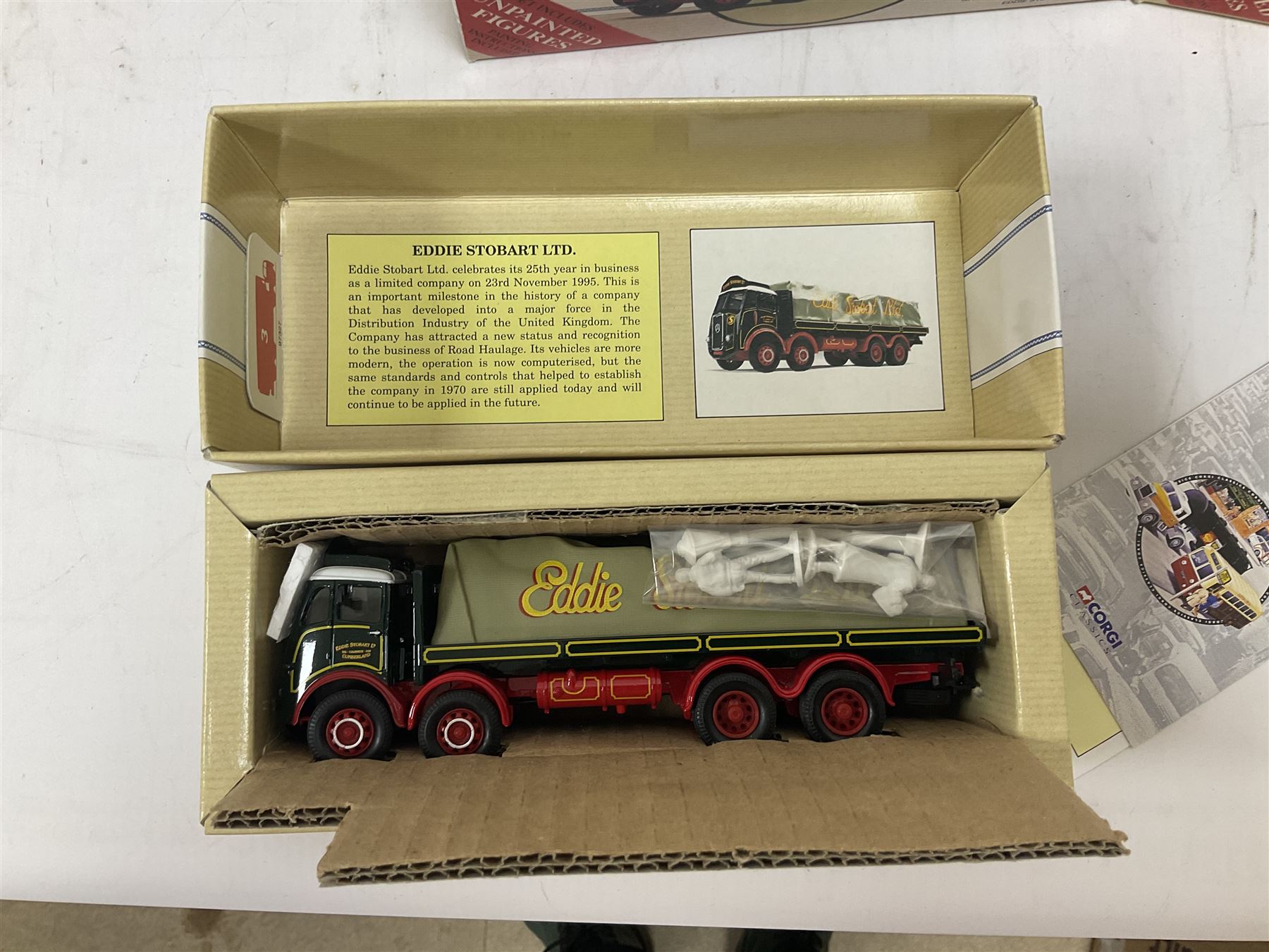 Corgi Classics Eddie Stobart - fifteen die-cast promotional models - six 97327 Atkinson 8 Wheel Rigid; two 97940 ERF Flatbed; CC10805 Foden S21 8 Wheel Platform Lorry; 31701 Foden 8 Wheel Rigid Truck & Mini Van; 11001 ERF KV 8 Wheel Dropside lorry; 31704 Morris 1000 Pick-Up and Thames Platform Trailer; 97369 AEC Truck & Trailer; 23101 Ford Transcontinental Tilt Trailer; and 13601 Foden S21 Mickey mouse with trailer; all boxed (15)