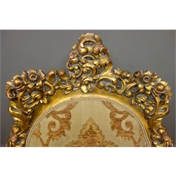  Large French Rococo style giltwood open armchair, moulded frame pierced and carved with foliage and scrolls, brocade upholstered seat and back, on cabriole legs, H120cm  