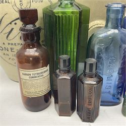 Virol bone marrow stoneware jar, two stoneware hot water bottles and a collection of small apothecary bottles to include amber and green glass examples, some with stoppers and labels, jar H24cm
