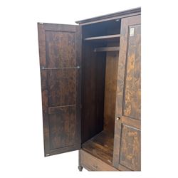 Marks & Spencer - dark wood double wardrobe, fitted with single drawer, on turned feet