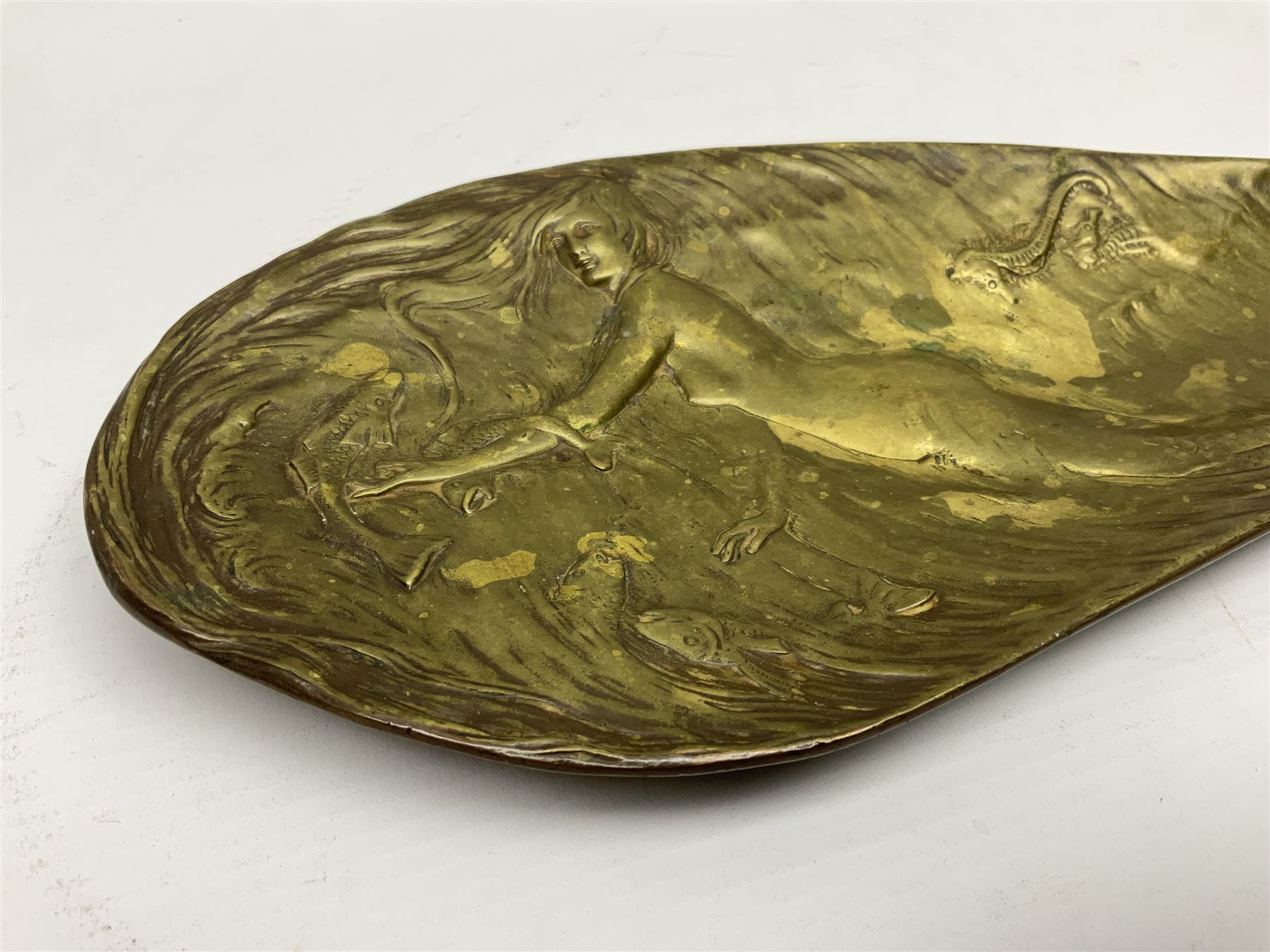 Bergman Art Nouveau bronze dish, of naturalistic shell form upon four shell feet, the centre decorated in relief with a mermaid amongst fish and sea horses, with Bergman mark and impressed Geschutzt 5070 beneath, L36cm