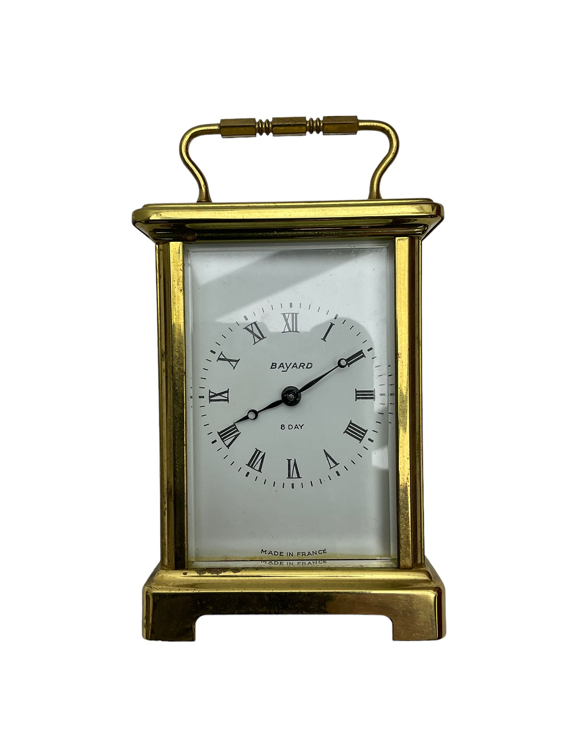  20th century French cornice “Bayard” 8-day timepiece carriage clock, with a lever platform escapement, enamel dial with roman numerals and minute track and Haller Torsion clock with acrylic dome
