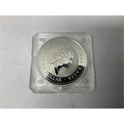 Four Queen Elizabeth II one ounce fine silver coins, comprising Australia 1994 Kookaburra and three United Kingdom Britannias dated 2002, 2009, 2010