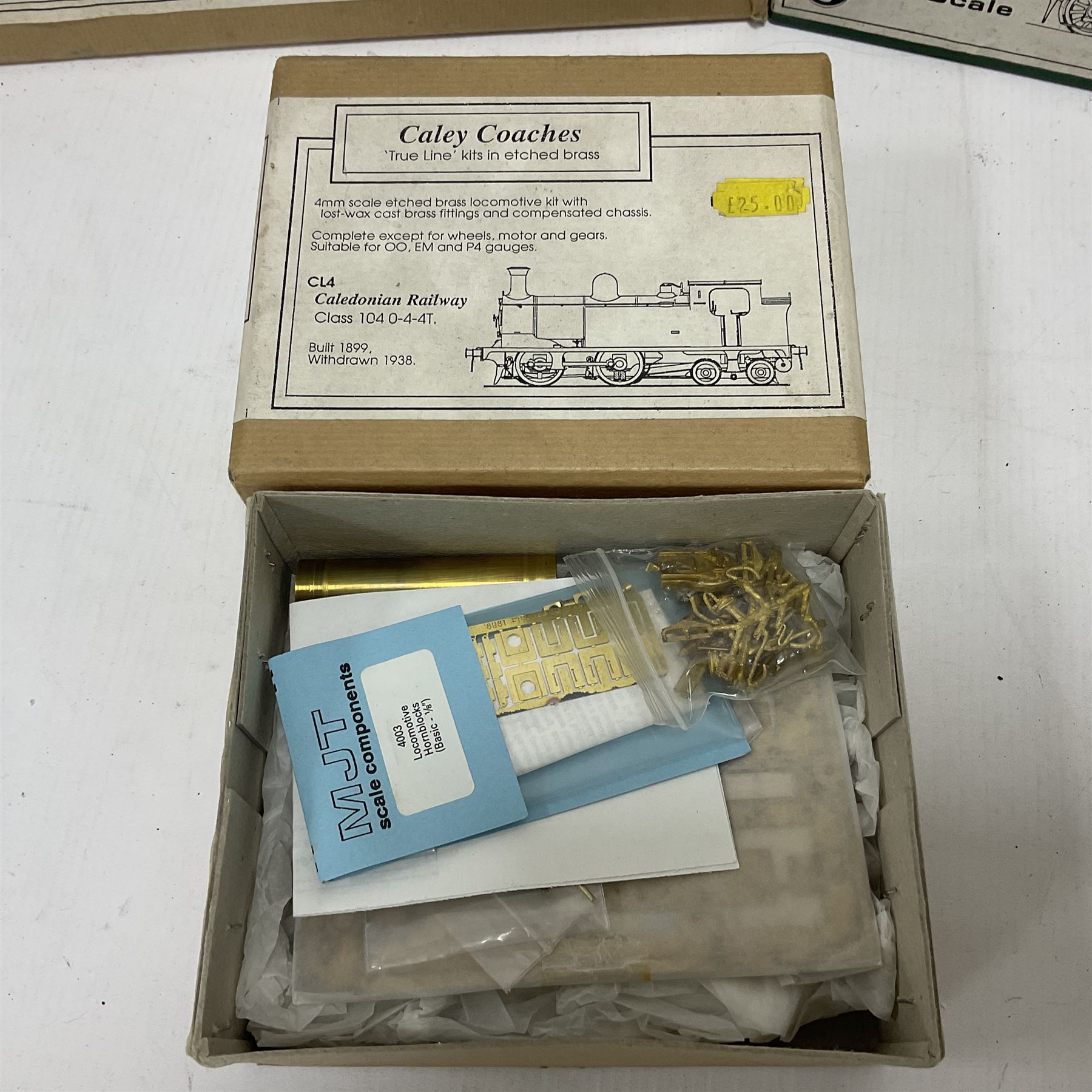 ‘00’ gauge - six model railway locomotive building kits comprising DJH Models CR/LMS/BR Wemyss Bay 4-6-2 Tank 944 Class, Caley Coaches CL4 Caledonian Railway Class 104 0-4-4T and CL2 Caledonian Railway Class 812 & 652 0-6-0 loco and tender, Mallard Models GWR 517 Class 0-4-2T body and chassis kit, Tru-Cast SR Class USA Tank locomotive and Pro-Scale LNWR Coal Tank; in original boxes 