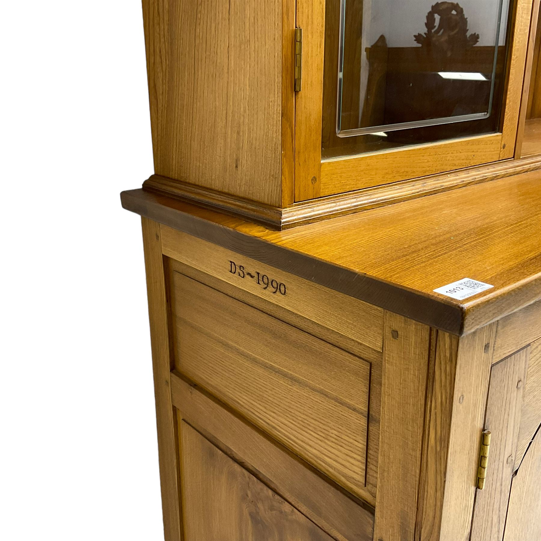 David Shackleton of Snainton - highly figured elm dresser, projecting moulded cornice over raised display cabinets and shelves, the base fitted with three central drawers and flanked by panelled cupboards, inscribed 'DS 1990'