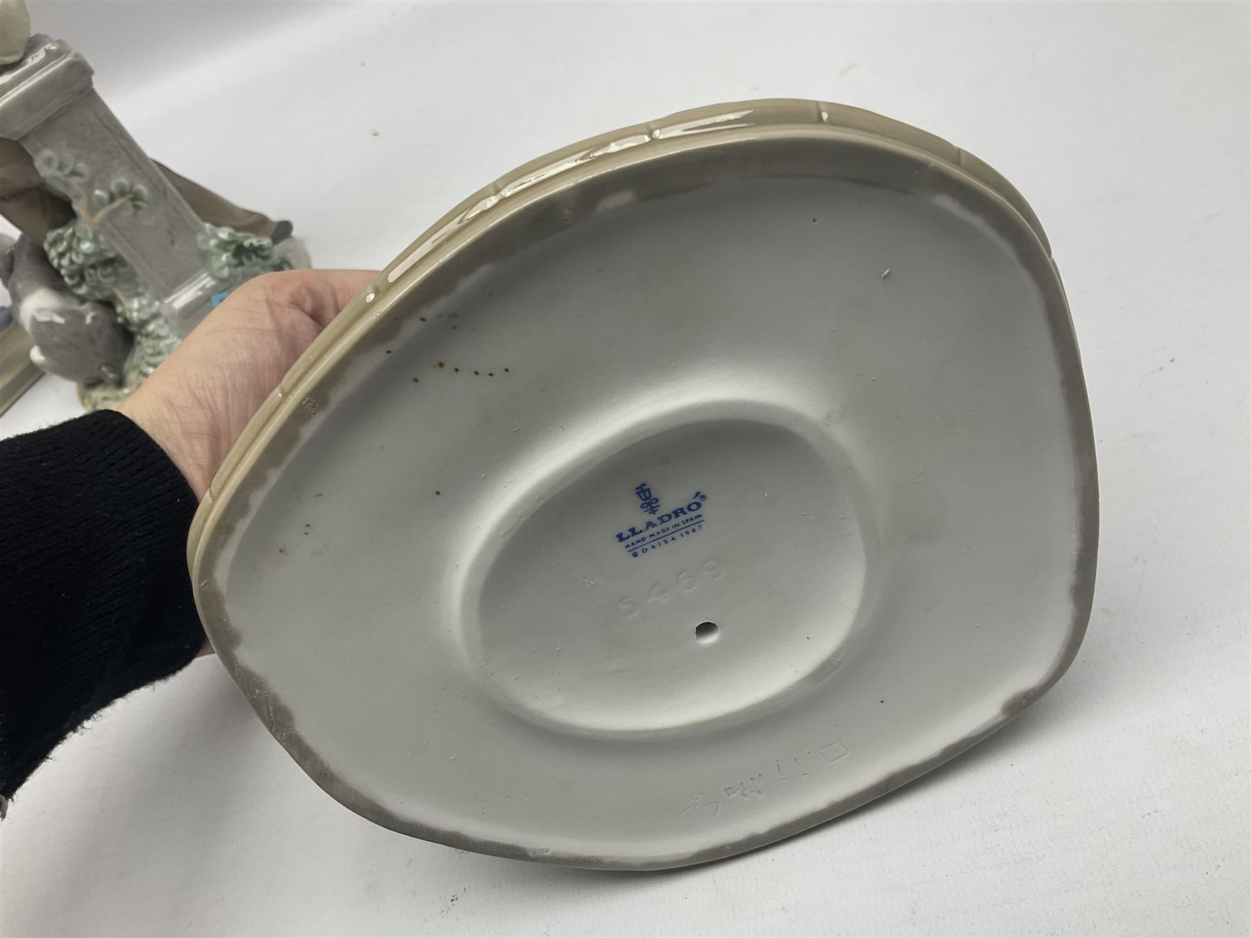 Three Lladro figures, Faithful Steed no 5769, Best Foot Forward no 5738 and Lambkins no 5469, all with original boxes, largest example H21cm 