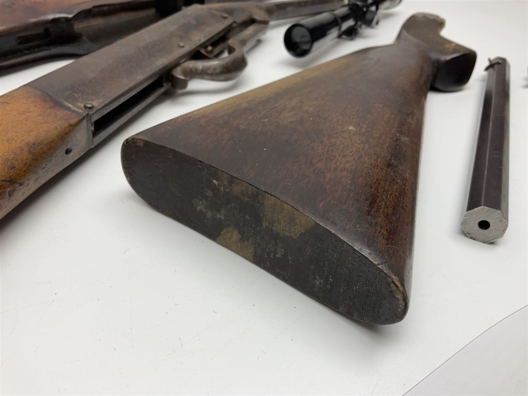 Assorted rifle and pistol spares; early Gem air rifle with sawn off barrel (piece present); telescopic sight; canvas/leather ammunition pouch; Mauser stock; barrel browning solution etc