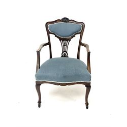 Late Victorian mahogany armchair, shaped top rail, shaped splat, upholstered seat and back, cabriole supports and castors 