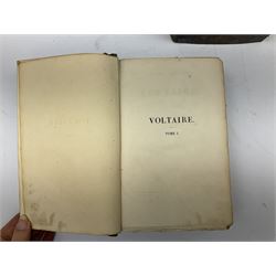 Eighteen 19th century leather bound books including Oeuvres Completes De Voltaire. 1827 Paris. Two volumes; Oeuvres De Pierre Corneille. 1892 Paris; Commentarium in Librum Geneseos Scripsit Thomas Josephus Lamy. 1883 Mechliniae; etc (18)
