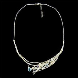 Silver and 14ct gold wire blue topaz, am
