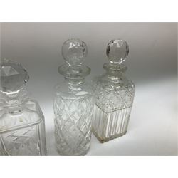 Four Victorian and later clear glass decanters, in one box 