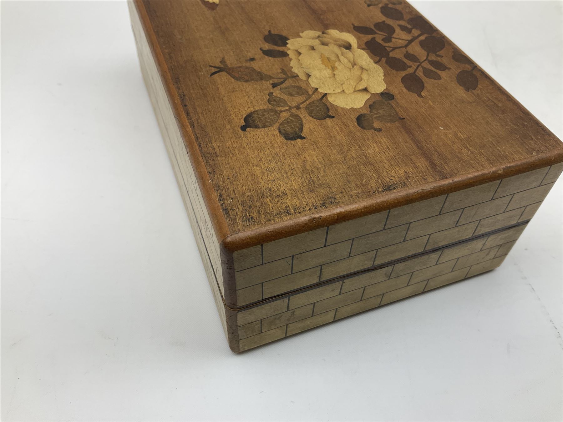 Japanese parquetry puzzle box L12cm; another Japanese puzzle box with marquetry top of Mount Fuji; eleven graduated Chinese figures including immortals; and Chinese figure of a lady standing on a hardwood base next to a horn table (14)