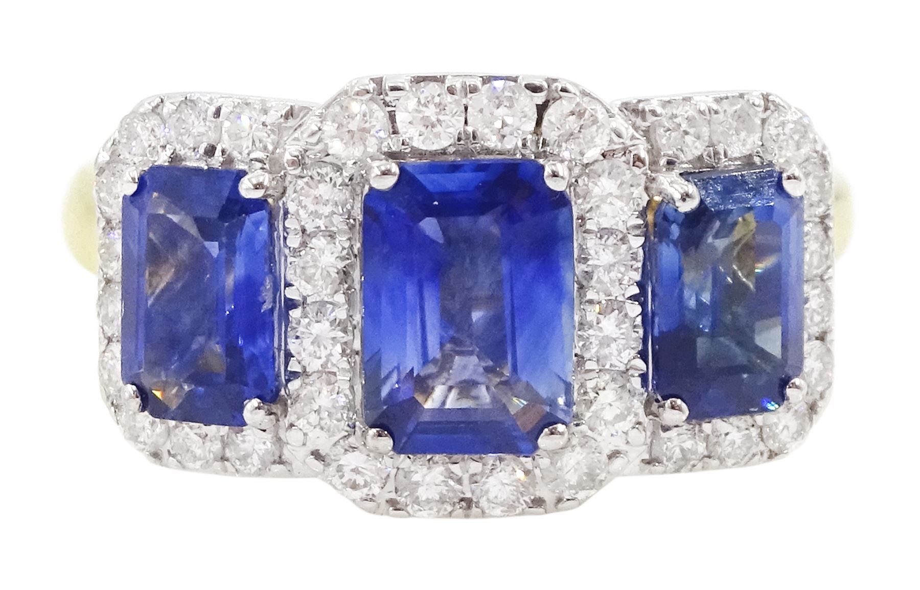 18ct gold sapphire and diamond cluster ring, three emerald cut sapphires, with round brilliant cut diamond surround, hallmarked, total sapphire weight approx 2.25 carat, total diamond weight approx 0.50 carat