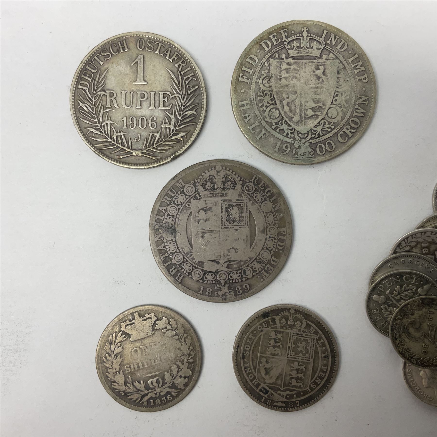German East Africa 1906 one rupie, Queen Victoria 1889 and 1900 halfcrowns, various pre-1947 Great British silver threepence pieces etc