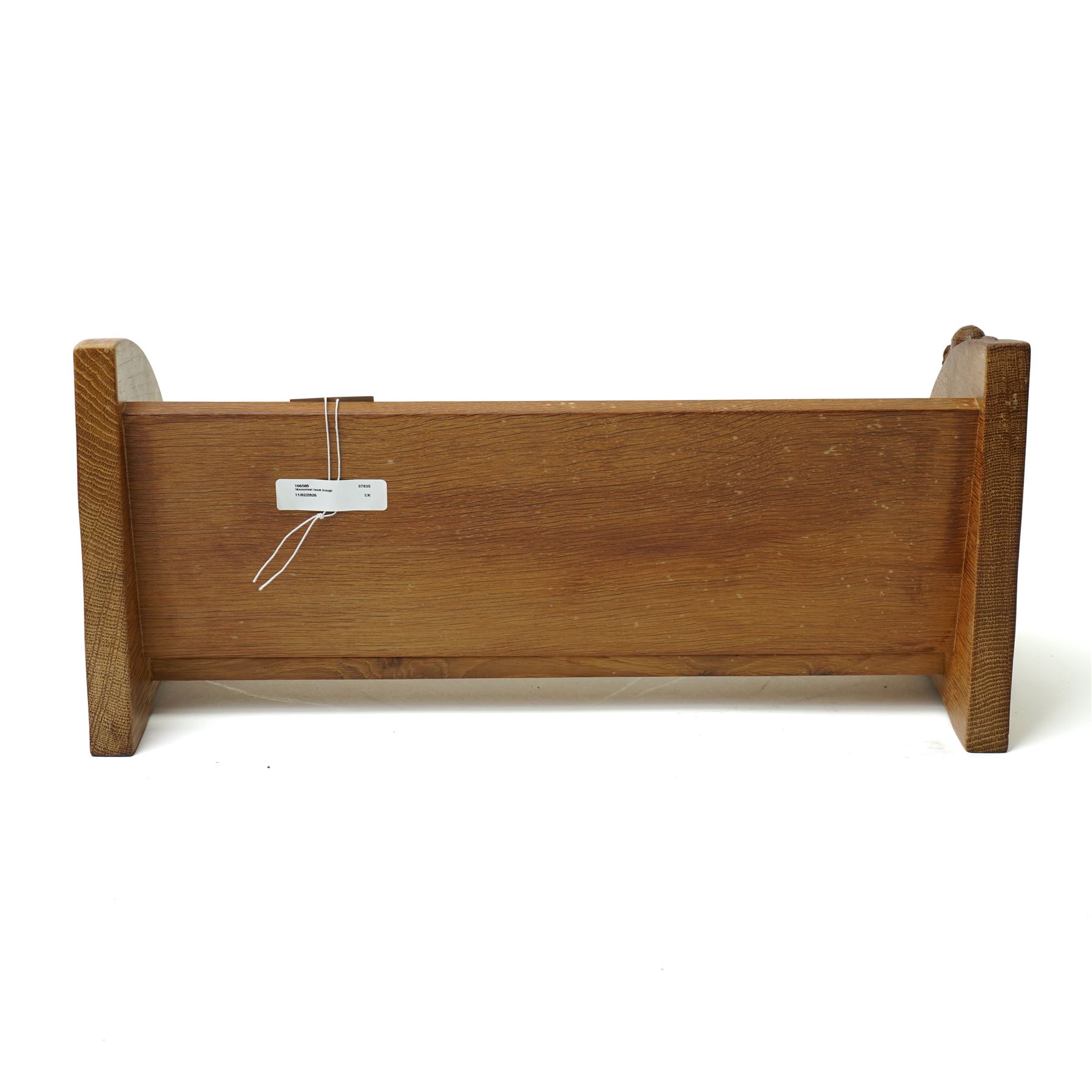 Mouseman - oak book trough, curved end supports, with carved mouse signature, by the workshop of Robert Thompson, Kilburn W45.5cm