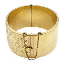 9ct gold wide hinged bangle, with bright cut foliate decoration, by Smith & Pepper Ltd, Birmingham 1963, boxed