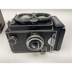 Rollei Rolleiflex 3.5C camera body, serial no 1775847, with 'Planar 1.35 f-75mm' lens serial no 1788432 and 'Heidosmat 1:2.8/75' lens serial no 2440876, complete with a cased set of additional lenses 