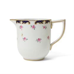 Wedgwood tea service decorated with floral sprays within a blue and gilt border comprising five cups, ten saucers, seven plates, two bread and butter plates, milk jug and sugar bowl