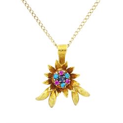 18ct gold ruby, sapphire and turquoise flower head pendant, set with single sapphire, surr...