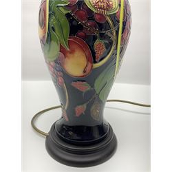 Moorcroft table lamp of baluster form, decorated in the Queens Choice pattern by Emma Bossons, H49cm