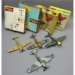  Four Dinky die-cast models of WW2 aeroplanes: Spitfire Mk II No.719, Junkers Ju87B Stuka No.721, Hawker Hurricane Mk IIc No.718 and Messerschmitt B.F.109E No.726, all boxed  