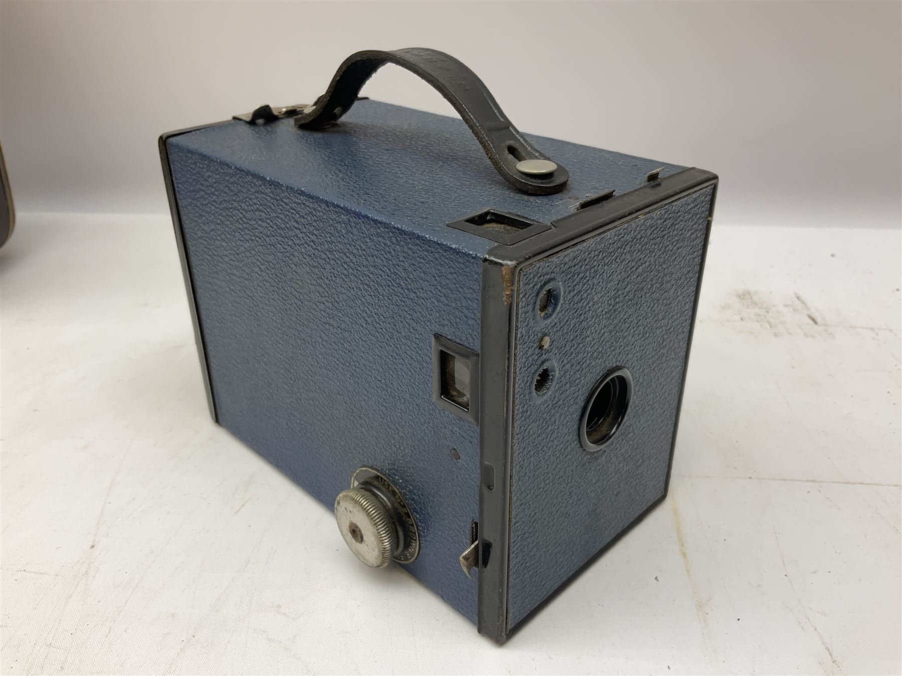 Pair of Rayswi of Harrogate carved oak candlesticks with brass mounts, in the form of an imp, together with a cased pair of Photopia binoculars, mother of pearl opera glasses, Bush radio, oak inkstand etc