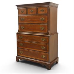 Georgian design mahogany chest on chest, moulded projecting cornice over three short and two long drawers, canted fluted front corners, lower section fitted with three long drawers, brass pierced backplate handles and escutcheons, on shaped bracket feet