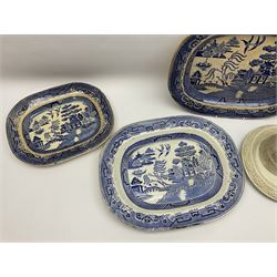 Three Victorian blue and white meat platters, together with a Victorian jug, the body of tapering form with moulded brick effect decoration with Victorian registration lozenge beneath, and a Victorian pottery stand