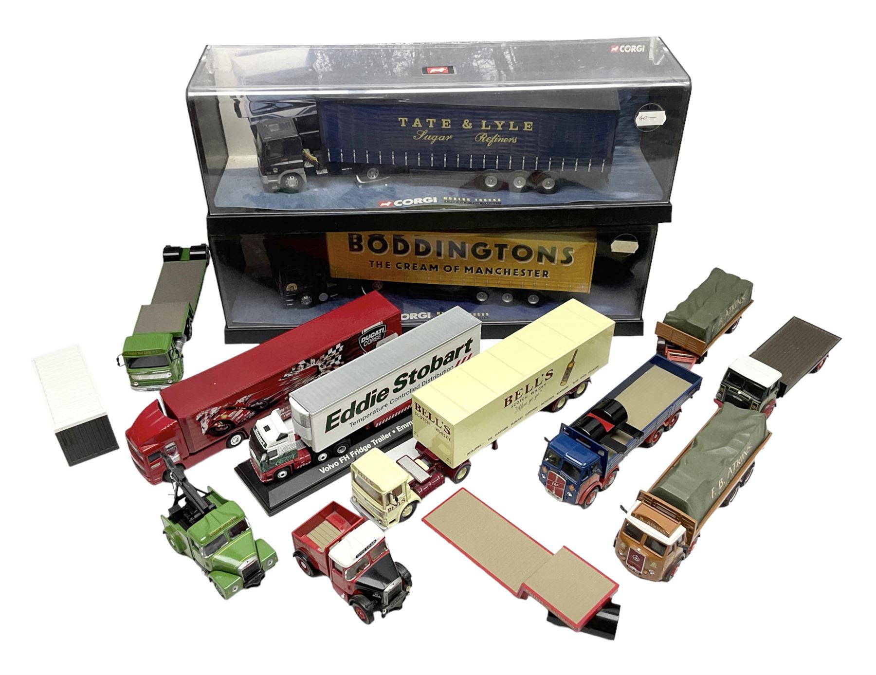 Corgi - two perspex cased 'Modern Trucks; 75202 ERF Curtainside Boddingtons and 75402 Leyland-DAF Curtainside Tate & Lyle; and nine unboxed Corgi lorries (11)