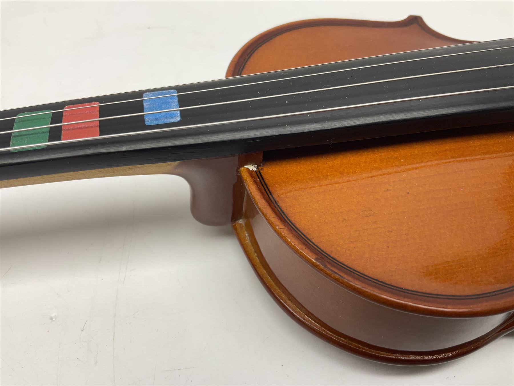 Four student violins - two Chinese three-quarter size with 33.5cm and 34cm two-piece backs; Stringers of Edinburgh quarter size with 28cm two-piece back; and Stentor quarter size with 28cm two-piece back; each in carrying case (4)