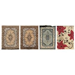 Four rugs of various styles; one 20th century oriental design rug, sage green field with g...