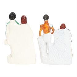 Group of 19th century Staffordshire figures, comprising pair depicting Queen Victorian and Prince Albert, she stood crowned, wearing short cloak, her hand clasped in front of her waist, he wearing cloak and military jacket, tallest example H28cm, figure group depicting The Prince and Princess Alexandra of Denmark, later Princess of Wales, he wearing green jacket and holding top hat in his left hand, she wearing bodice and full length skirt and carrying hat over he right arm, H24.5cm, and figure group depicting Empress Eugenie and Napoleon III, he in uniform, his left hand upon a plinth, she seated in chair, H23.5cm