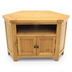 Modern light oak corner television stand, open recess above two cupboard doors with aperture to the back