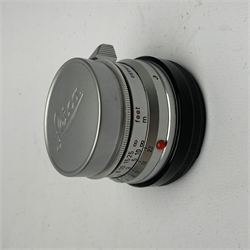 Leica M2-1013180 camera fitted with Leica Summicron 1:2/50 Leitz Wetzlar lens (1764800) and UVa filter, and Leica-Meter MR in leather case together with; Leica Elmarit 1:2.8/90 LW lens (1805634), Leica Summaron 1:28/35 LW lens (1782507), Leica M3 M2 adapter ring, Leica filters yellow and orange cased, three Leica lens hoods IUFOO, IROOA and 12585H (boxed), Leica pocket book, guide and 1960s survey catalogue & price guide leaflet, with original M2 camera box