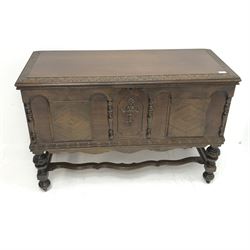 20th century walnut blanket chest, hinged top with relief carved foliate banding, on turned and carved supports connected by shaped moulded stretchers, W116cm, H76cm, D49cm 