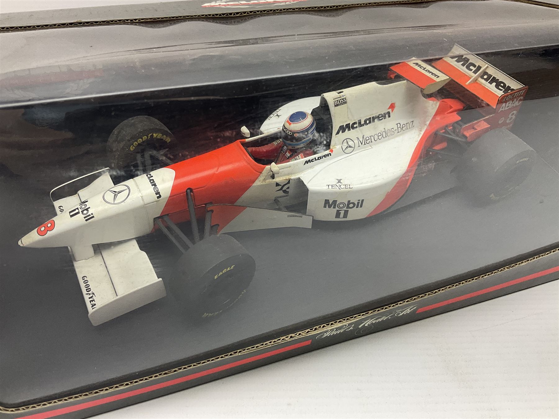 Three Paul's Model Art 1:18 scale die-cast McLaren racing cars - Mercedes MP4/11 D. Coulthard; MP4/4 A. Prost; and Mercedes MP4/10 M. Hakkinen; all boxed (3)
