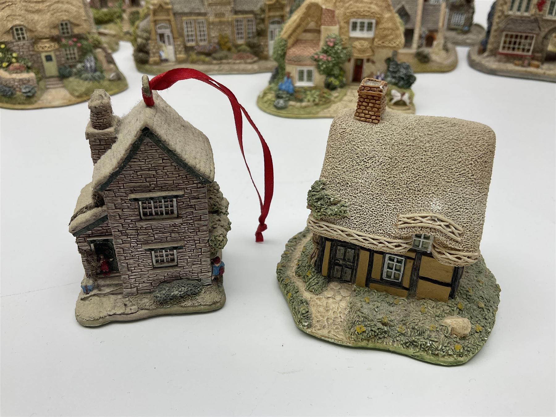 Twenty five Lilliput Lane, to include Village School, Greensted Church, The Chocolate House etc 