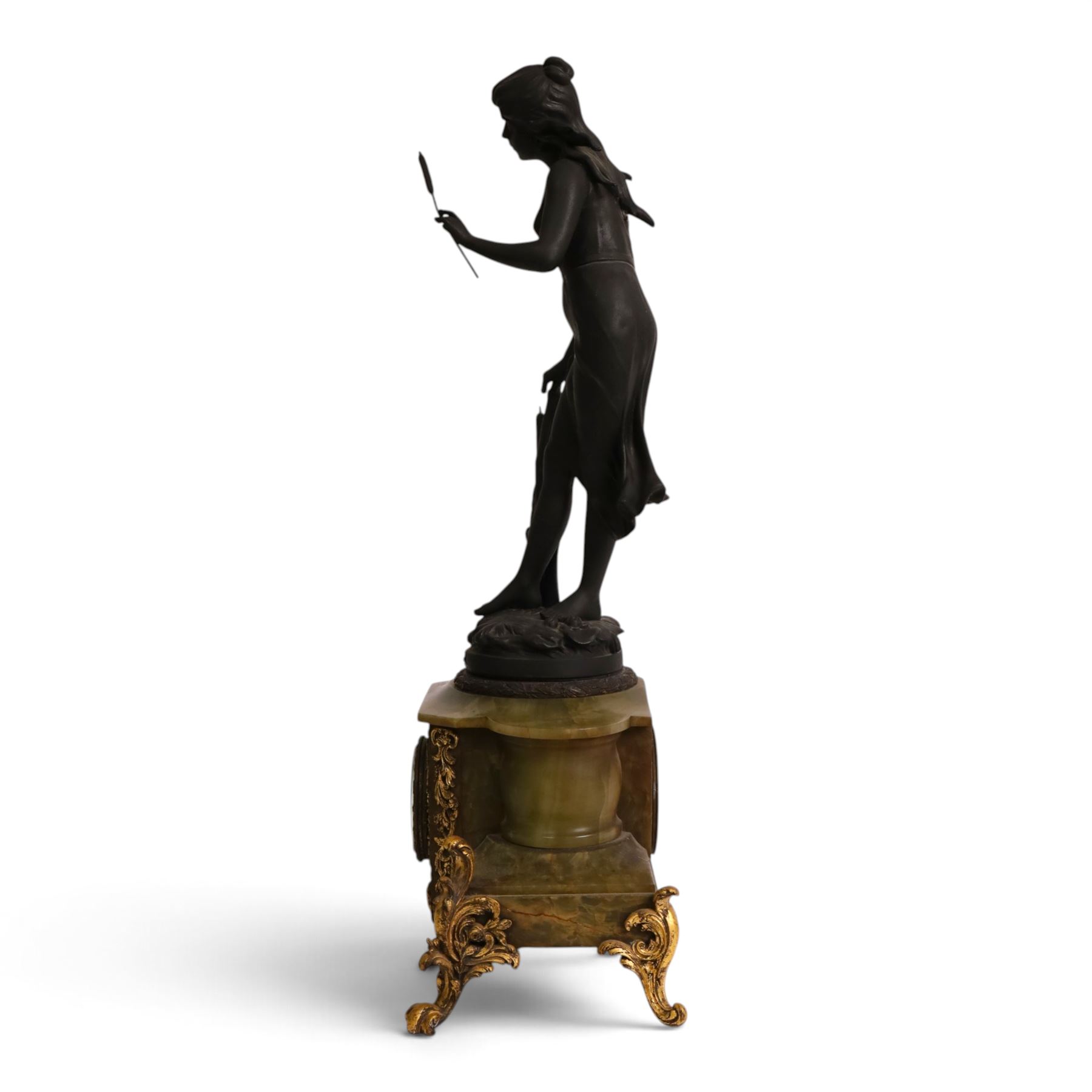 French green onyx clock, surmounted by a female figure amongst rushes, the enamel clock face with floral sprigs, H74cm 