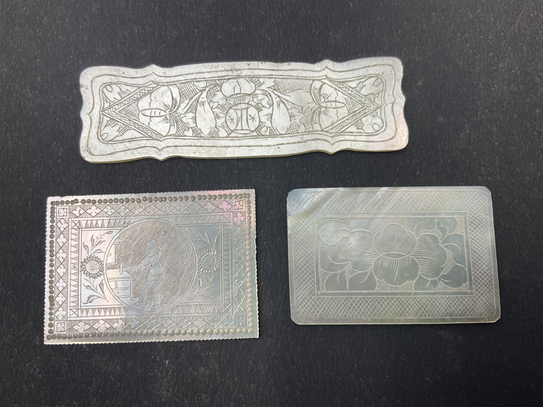 Two silver fruit knives with mother of pearl handles, hallmarked, mother of pearl tokens and similar items 