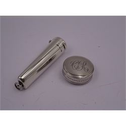 Early 20th century silver tape measure, of circular form, engraved with monogram, inscribed Chesterman Sheffield England to edge, hallmarked James Chesterman & Co, Sheffield 1912 together with a 1930s silver cheroot holder case, hallmarked Joseph Gloster Ltd, Birmingham 1938 containing a cheroot holder with hallmarked 9ct gold collar 