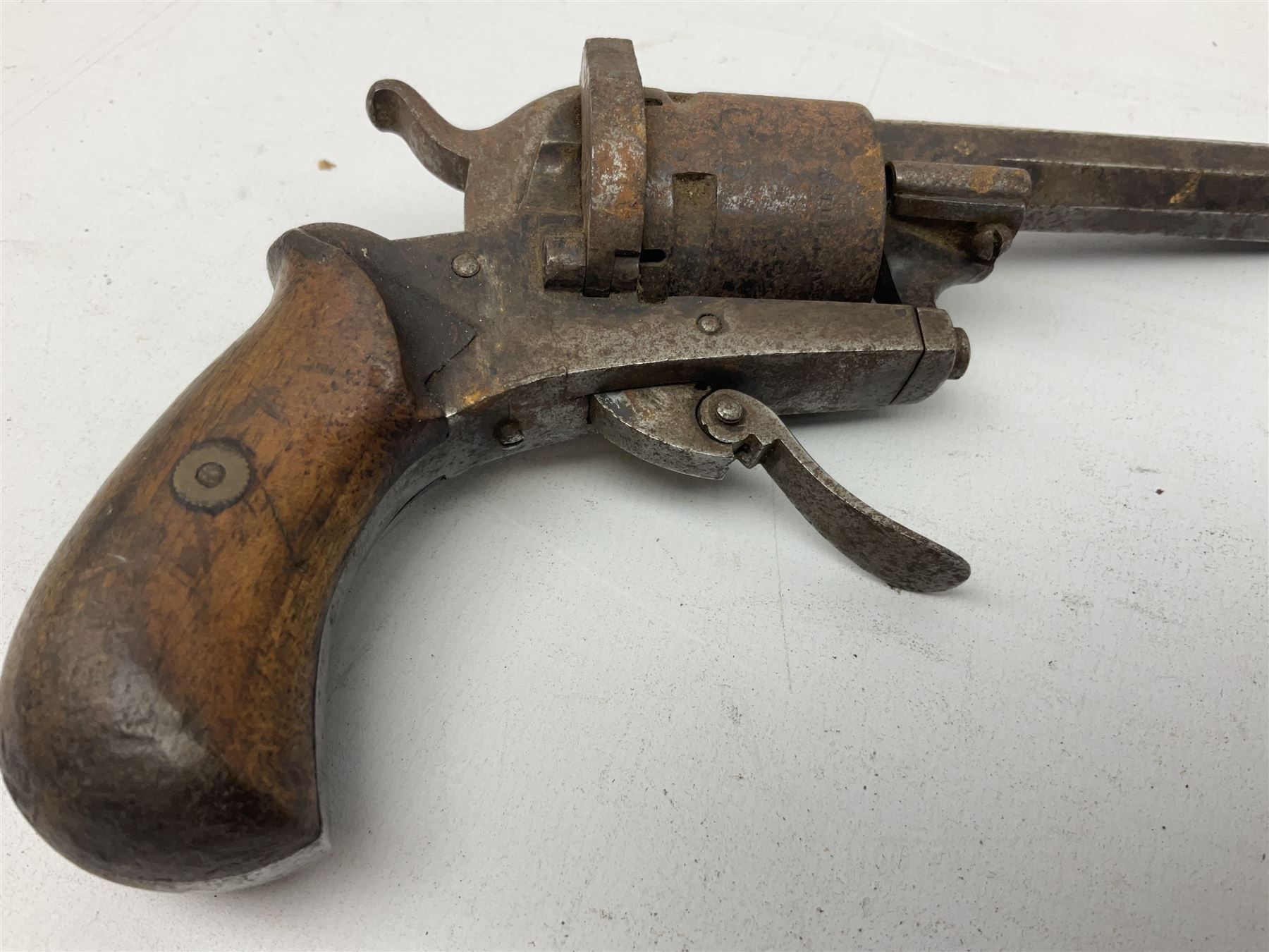 19th century 7mm five-shot pin-fire revolver, the cylinder marked 'The Savety (sic) American Revolver 1879', with folding trigger and two-piece walnut grip L18cm
