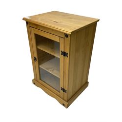 Pine media or television cabinet, enclosed by single glazed door (W56cm, H82cm, D43cm); pine corner cupboard, three shelves over single cupboard (W76cm, H188cm); pine two-tier plate rack with shaped frieze and uprights (W113cm, H107cm)