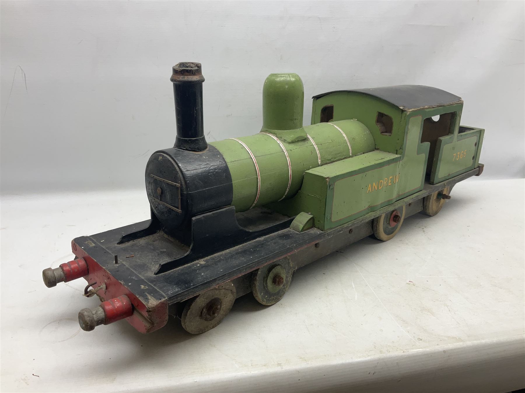 1960s scratch-built green, black and red painted wooden model of a 4-6-0 tank locomotive 'Andrew' No.7365 L88cm; and an unused wall mounting die-cast model display cabinet with glass door and shelves 52 x 40cm (2)